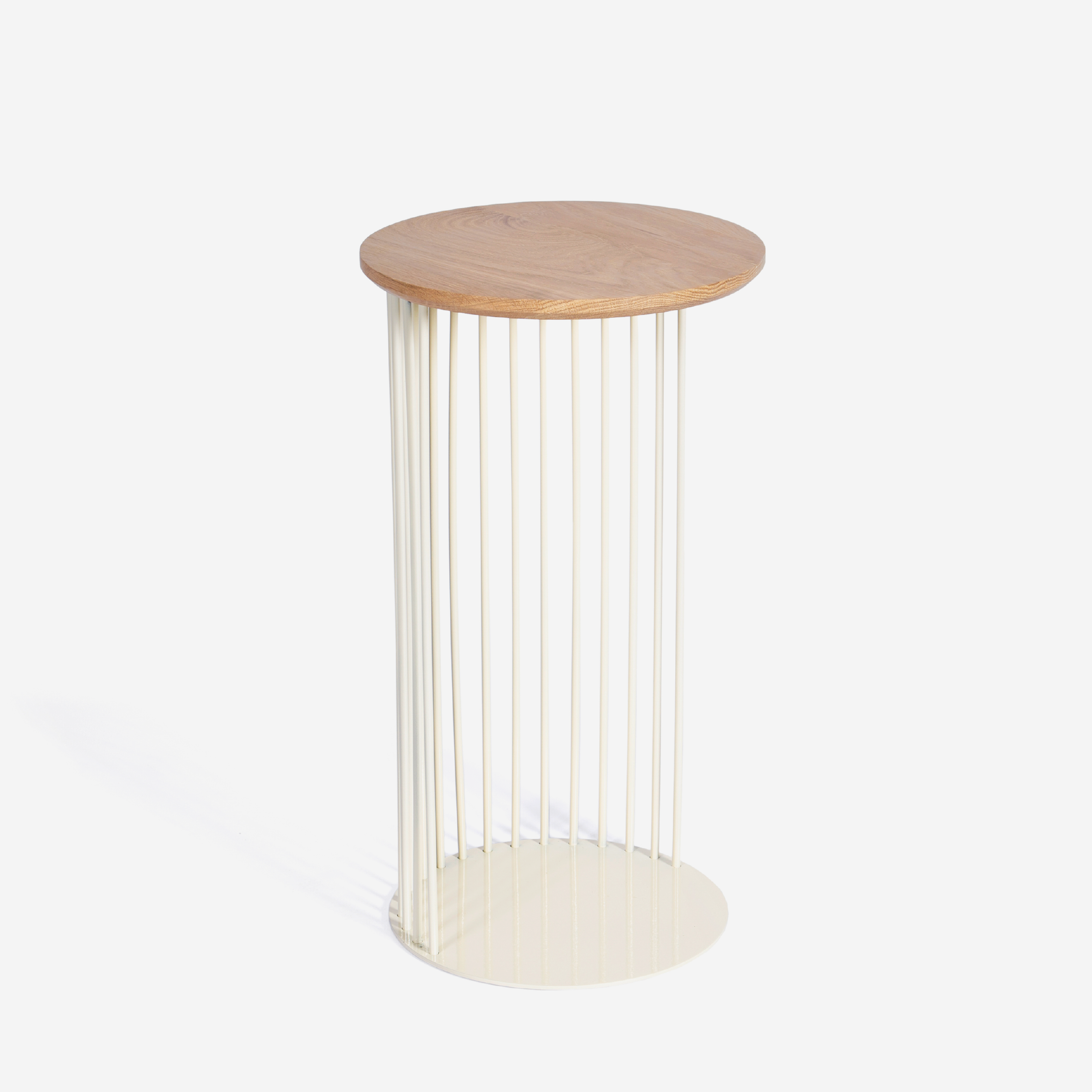 An end table in cream with an oak table top on a white background